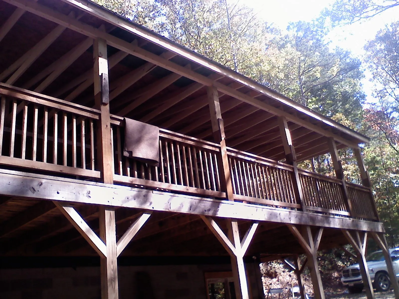Timber framing under a new elevated porch and deck — Roof Leak Repair in Aultman by Roofing Brothers